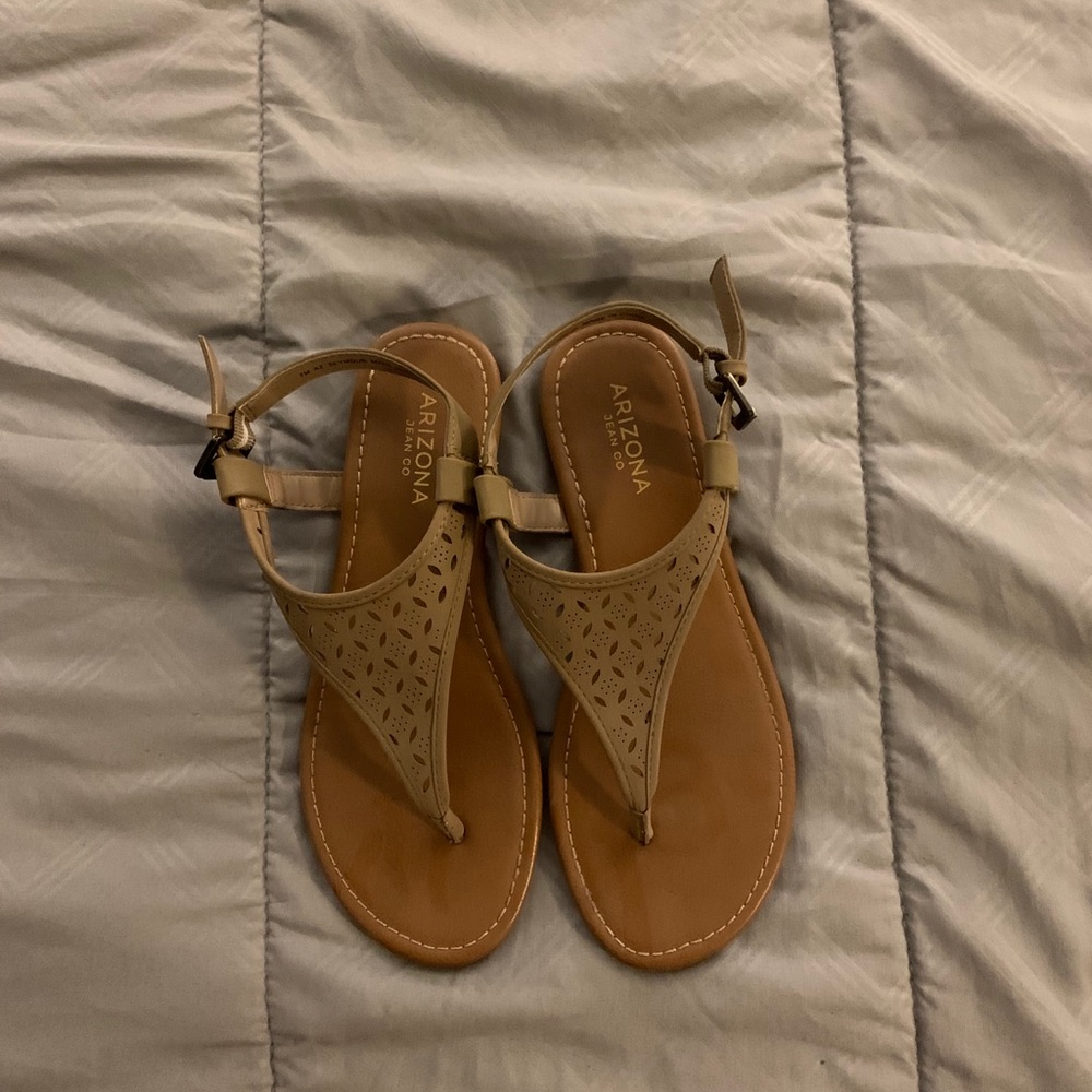 Beige sandals.